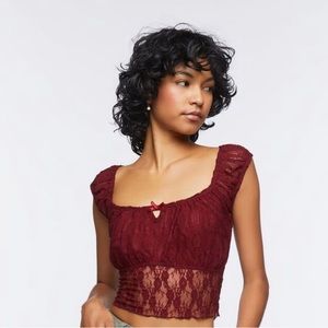 F21 burgundy lace front bow crop top